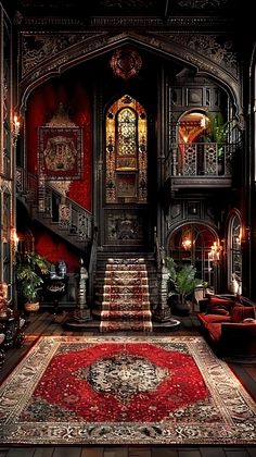 an ornately decorated room with stairs and red carpet