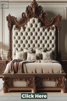 an ornate bed with pillows and blankets on it