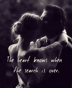 a man and woman kissing each other in front of trees with the words, the heart knows when he search is over