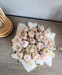 a bouquet of flowers sitting on top of a table