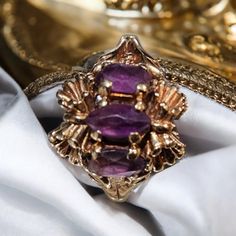 A TWO DAY SALE ONLY, GET READY FOR YOUR WEDDING WITH THIS TWO DAY SALE! NEVER BEEN A SALE LIKE THIS IN MY SHOP! SENDING BLESSING TO YOU ON YOUR SPECIAL DAY! I have listed this Vintage 3 Stone Amethyst and 10K gold Ring. This ring is in good condition and ready to wear. The perfect gift for her. See photos for measurements. ring sizer says size: 5  Please ask any questions. I don't mind helping. Women Gold Ring, 10k Gold Ring, Amethyst Stones, Ring Sizer, Ring Color, Amethyst Stone, Perfect Gift For Her, Indian Jewellery, Ring Ring