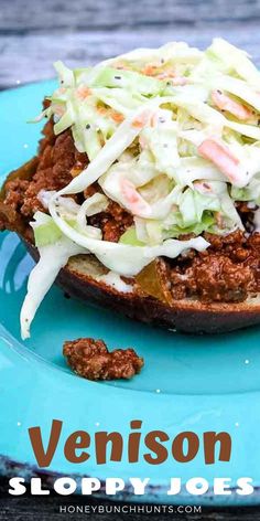 a close up of a sandwich on a plate with coleslaw slaw and meat