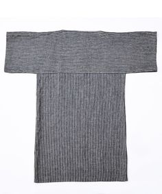 a black and white striped towel on a white background