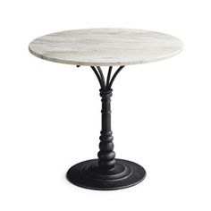 a white marble table with black metal legs and an iron base, on a white background