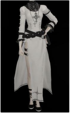 a mannequin dressed in white and black with a long dress on it's chest