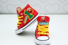 How adorable are these Elmo inspired converse! The perfect shoe to complete the look! Please leave your name needed in the notebox during checkout If you are unsure of sizing please scroll to the last photos for our size charts, or visit our size charts here--> https://pinktoesnhairbows.com/pages/size-chart All sales are FINAL, Ship dates can be found directly on the listing, please view our policies in detail here---> https://pinktoesnhairbows.com/pages/policies-terms-conditions Customizable Cute Lace-up Sneakers, Cute Customizable Lace-up Sneakers, Customizable Lace-up Cute Sneakers, Customizable Cute Low-top Sneakers, Elmo Shoes, Elmo Birthday Party Boy, Baby Elmo, Shark Shoes, Overalls Boys