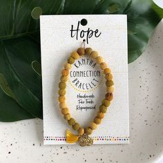 Hope reminds us of our limitless potential for the future. This Hope Bracelet brings new possibilities to women artisans in India. Hope Bracelet, Yellow Bracelet, Bracelets With Meaning, Local Gifts, New Possibilities, Handmade Fair, 15 Gifts, Craft Bags, 30 Gifts