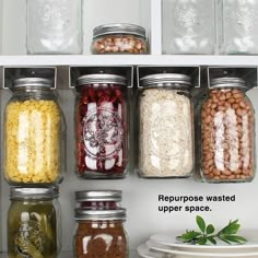 jars filled with different types of food on top of a shelf