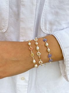 Minimal cute and dainty daisy bracelets are perfect for a natural jewelry lowers! Made using natural silk cord, pearls, 24K gold plated beads or palladium plated beads (beads with real gold or palladium layer). It's original jewelry, beaded by hand. You can combine in a lot of ways with your own jewelry and your casual or festive outfits. This bracelets are perfect for best friends! LENGTH: adjustable, the max diameter is around 9 cm/3.5 inches; the max lenth is around 28 cm/11 inches. CLOSURE: Dainty Friendship Bracelets, Delicate Adjustable Bracelets For Summer, Delicate Adjustable Summer Bracelets, Delicate Adjustable Bracelet For Summer, Gold Daisy Jewelry For Summer, Dainty Spring Beaded Bracelets, Gold Daisy-shaped Jewelry For Summer, Dainty Summer Jewelry For Friendship, Adjustable Gold Pearl Flower Bracelet