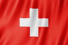 the flag of switzerland is shown in this close up photo with silky folds and waves