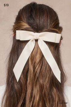 Chic and feminine, adding the Lulus Graceful Presence Ivory Bow Hair Clip Set to any look will make it instantly cuter! Sleek woven fabric shapes this essential set that features two classic hair bows that with a two-layered design and effortlessly elegant long tails. Silver barrette closures will perfectly secure your locks for a hairdo that lasts all day! Bow measures 5. 25" wide. Ribbon measures 4. 25" long. 90% Brass, 10% Iron. Imported. Lulus | Graceful Presence Ivory Bow Hair Clip Set. Bridal Shower Hair With Bow, Bridal Satin Hair Bow, Elegant Wedding Hair Accessories With Ribbon, Cute Wedding Hair Accessories With Decorative Bow, Adjustable Wedding Hair Accessories With Decorative Bow, Classic Hair, Bow Hair Clip, Wedding Top, Layered Design