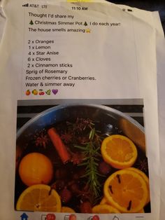 a recipe for christmas dinner with oranges and cranberries in a pan on top of paper