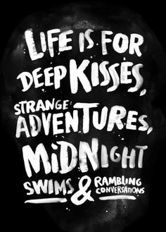 a chalkboard with the words life is for deep kisses, strange adventures, midnight swims and swimming