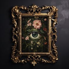 an ornate gold frame holds a painting with flowers and an eye in the center, against a dark background