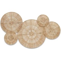 four round wicker coasters on a white background