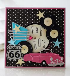 a close up of a greeting card with a car and stars on it's side