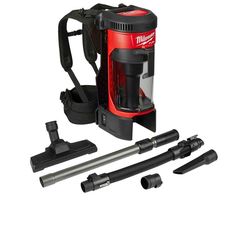 a red and black vacuum is next to some tools