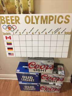 the beer olympics board has been placed on top of some bud light boxes in front of it