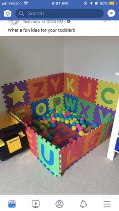 a child's play room with foam tiles and toys