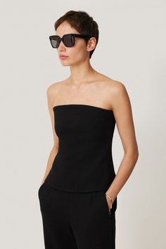 A minimalist's dream, this strapless top embodies understated elegance for evening. Crafted from crepe ponte, a soft, mid-weight fabric with subtle stretch endorses comfort throughout the night. Internal boning at the sides adds structure while sitting close to the body. Machine washable. Upper 95% Polyester, 5% Polyurethane. Lining 100% Polyester. Wedding Guest Dress Summer, Understated Elegance, Cashmere Coat, Clothing Care, Shop Swimwear, Workwear Dress, Maternity Clothes, The Body, Wedding Guest Dress