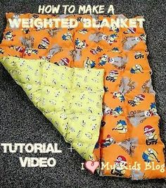 an orange and yellow sleeping bag with the words how to make a weighted blanket on it