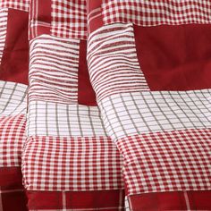 a red and white checkered bed spread