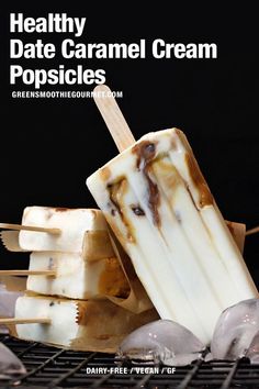 two popsicles are stacked on top of each other with ice cream in the middle