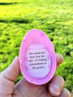 someone is holding up a pink plastic object with a quote on it that says, we saw the best rules for last's riding somewhere in the grass