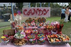 a table topped with lots of candy and candies