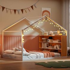 a child's bedroom with a bed and bookcase in the corner, lights strung from the ceiling