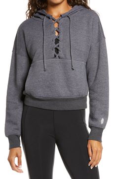 Soft and slouchy, this lace-up fleece hoodie is your comfortable reward for all the hard work you do in the gym and the studio. Style Name:Free People Fp Movement Believe It Lace-Up Hoodie. Style Number: 5843628.