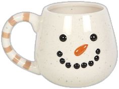 a ceramic mug with a snowman face on it