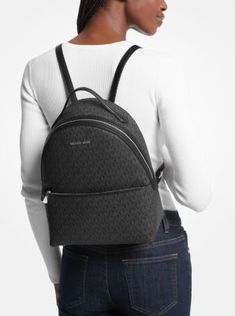 From gym sessions to city commutes, our Sheila backpack has you covered. The Signature Logo-print canvas style comes with a dedicated pocket inside for your tablet, as well as a front zip pouch for smaller items. Adjust the buckled \ straps on the back for the perfect drop. Casual Travel Backpack With Logo, Casual Coated Canvas School Bag, Trendy Travel Backpack With Logo, Coated Canvas Backpack With Zipper Closure For On-the-go, Casual Backpack With Coated Canvas, Coated Canvas Backpack With Zipper For School, Casual Coated Canvas Backpack, Everyday Coated Canvas Backpack With Logo, Casual Logo Backpack For Everyday Use