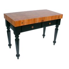 a wooden table with black legs and drawers