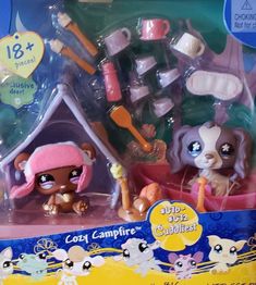 littlest pet shop playset with two dogs and a doghouse in the box