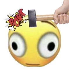 a hand holding a hammer over a yellow smiley face with the word bomb on it's forehead