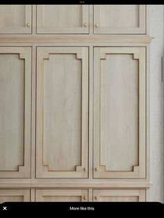 an image of a wooden cabinet with doors