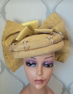 Beautiful Auto gele/headpiece for that upcoming occasion or event, suitable for wedding parties, bridesmaids outfits, engagement ceremony, owanbe, Igbo hausa wedding, Nigerian African wedding party, 40th birthday outfit, 50th birthday African dress etc. Message for preorder. Glamorous Gold Party Sets, Gold Fitted Sets For Evening, Gold Sets For Party Season, Gold Fitted Evening Sets, Elegant Gold Party Season Sets, Gold Sets For Festive Evening Occasions, Gold Party Wear Sets For Evening, Gold Sets For Evening Festivals, Elegant Gold Evening Set