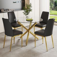 a glass table with four chairs around it