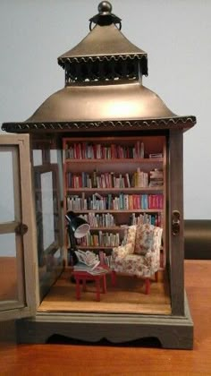 an old fashioned book shelf with a chair and bookshelf in the middle is on instagram