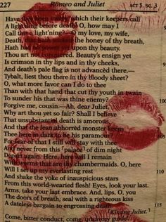 an old book with red lipstick on it and some words written in the bottom right corner