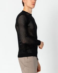 Dare to stand out with our See Through Fishnet Muscle Fit Shirt, the epitome of rebellious style and confidence. Crafted from high-quality fishnet fabric, this shirt offers a unique blend of sensuality and streetwear flair. Designed to showcase your physique, the muscle fit silhouette hugs your body in all the right places, accentuating your muscular build and adding a touch of allure to your look. The see-through nature of the fishnet fabric adds an element of mystery and intrigue, allowing you Black Mesh Top With Mesh Sleeves For Fall, Black Fishnet Mesh Top For Summer, Black Mesh Top With Crew Neck For Fall, Black Mesh Crew Neck Top For Fall, Edgy Black Mesh Top For Fall, Black Crew Neck Mesh Top For Night Out, Black Mesh Top For Fall, Black Crew Neck Mesh Top For Fall, Casual Black Long Sleeve Mesh Top