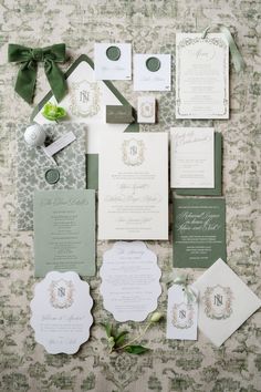 the wedding stationery was done in green and white