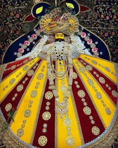 an elaborately decorated umbrella with gold and red accents