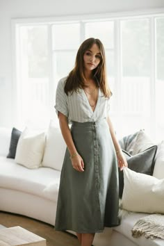 Meet the prettiest button down midi around. It'll make you want to go on picnics and frolic around a field of daisies. Am I right? Lightweight linen Style with a cropped tank Sage green Linen Button Down A Line Midi Skirt Model is 5'10" and wearing a size medium Fabric Content: Woven 55% Linen 45% Viscose Button Down Skirt Outfits, Button Skirt Outfit, Linen Skirt Outfit, Linen Skirt Midi, Denim Midi Skirt Outfit, Bicycle Aesthetic, A Line Skirt Outfits, Medium Sized Women, Long Linen Skirt