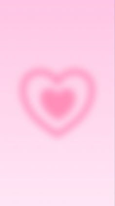 a pink background with a heart shaped shadow