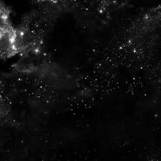 black and white photograph of stars in the night sky