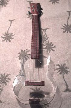 a small ukulele sitting on top of a table