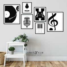 black and white wall art with musical instruments