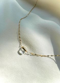 Clear Quartz 14kt Gold Necklace. Delicate Clear Quartz Pendant. Healing Quartz Pendant. Crystal Necklace. Christmas Gift for Her. - Etsy Elegant Herkimer Diamond Crystal Necklaces For Gifts, Elegant Herkimer Diamond Crystal Necklace Gift, Elegant 14k Gold Filled Crystal Necklace With Adjustable Chain, Elegant Gemstone Necklace In Clear Color, Minimalist Gold Quartz Jewelry, Elegant Clear Gemstone Necklace, Elegant Clear Necklace For Gift, Elegant Quartz Pendant Necklace, Minimalist Gold Teardrop Crystal Necklace